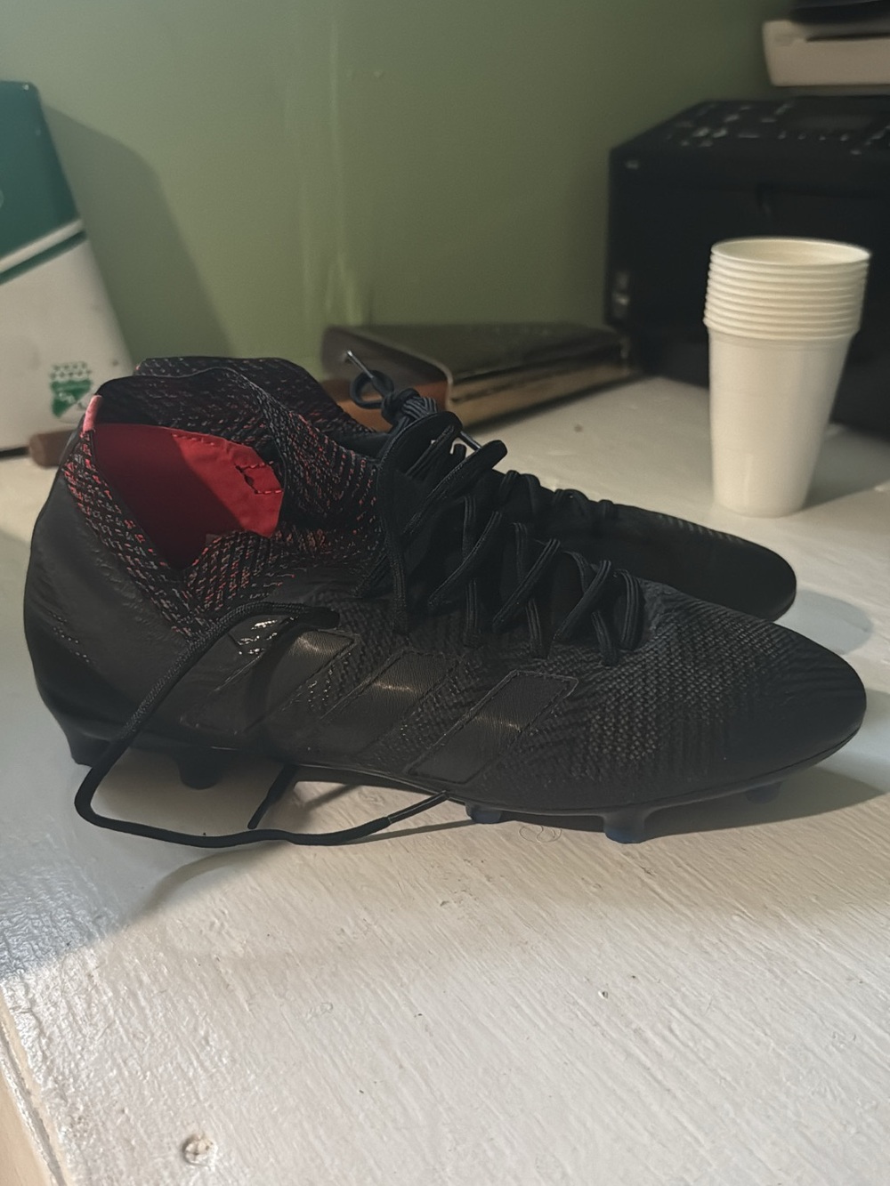 adidas Black Soccer Cleats with Red Lining
